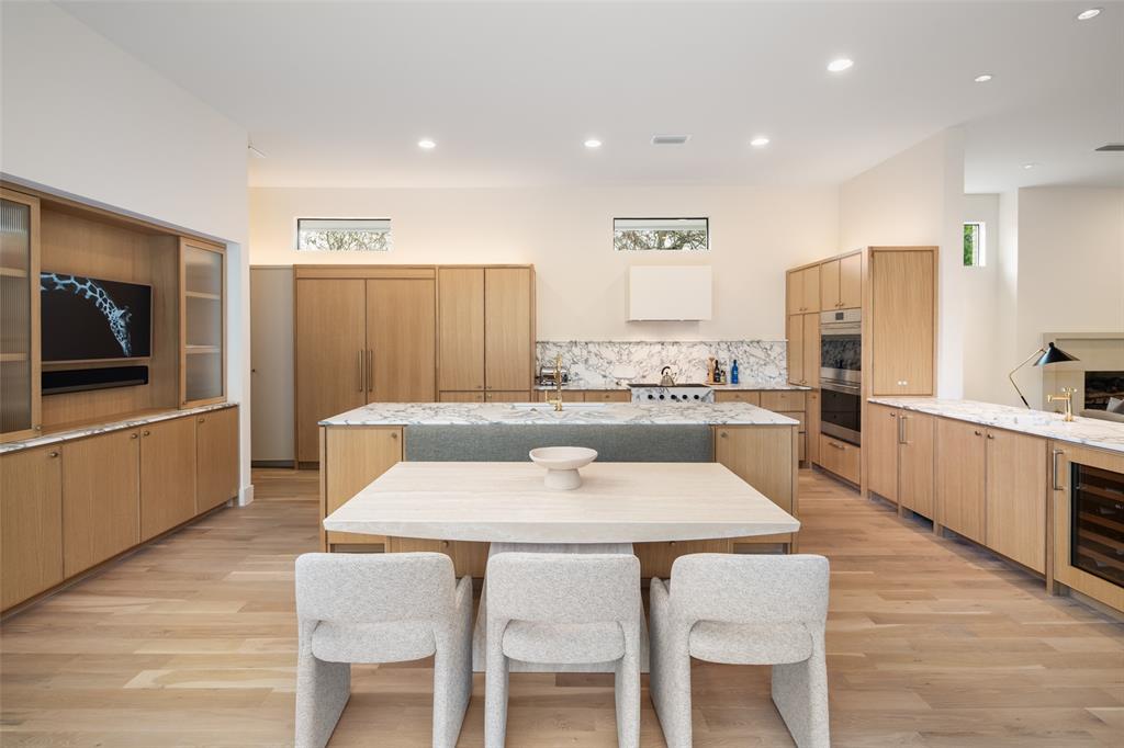 5000 Hanover Avenue Dallas, TX 75209 - Photo 14 of 36 a kitchen with a table and chairs in it