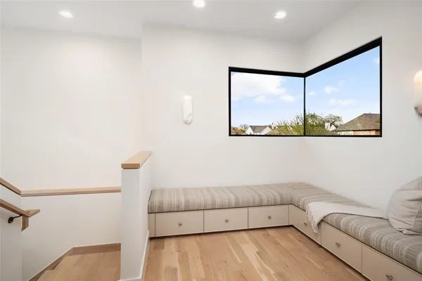 a living room with a couch and a large window