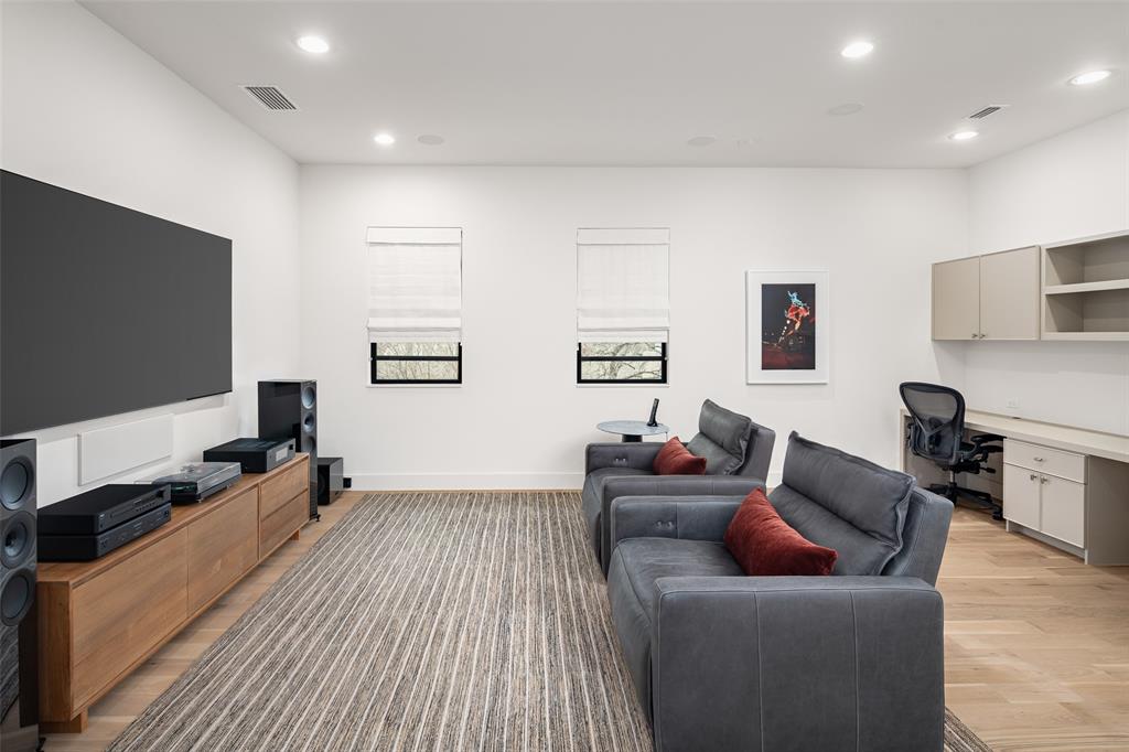 5000 Hanover Avenue Dallas, TX 75209 - Photo 24 of 36 a living room with furniture and a flat screen tv