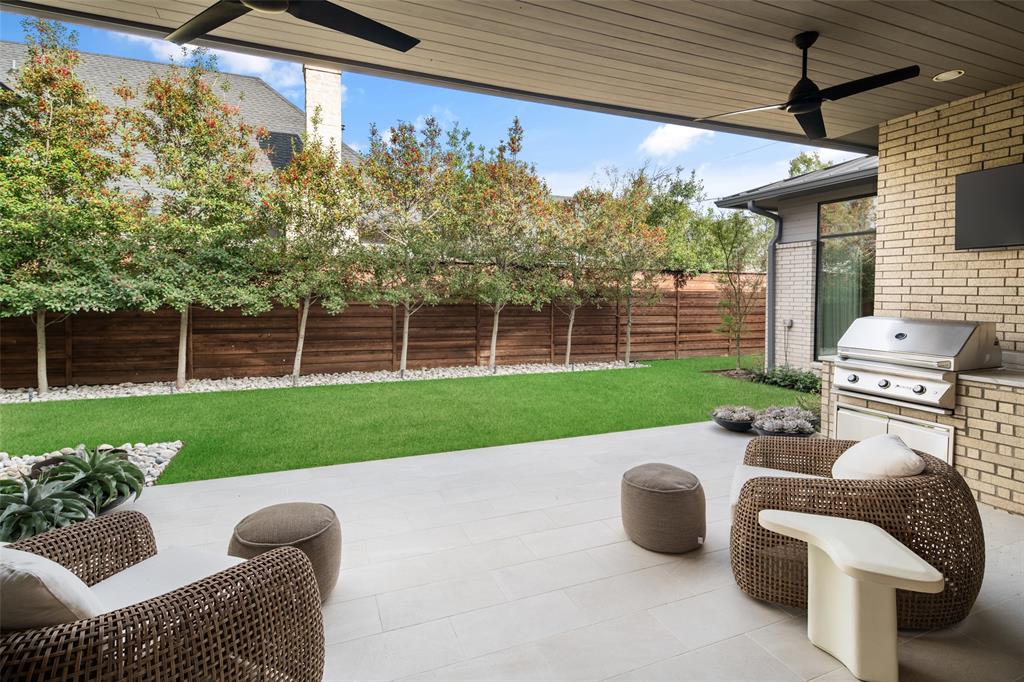 5000 Hanover Avenue Dallas, TX 75209 - Photo 26 of 36 a view of a porch with furniture and a yard