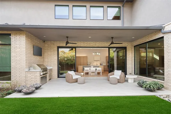 a view of sitting area in front of house