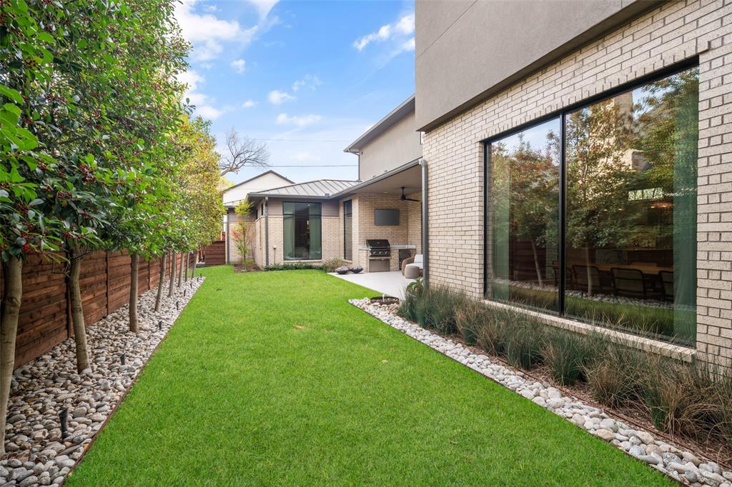 5000 Hanover Avenue Dallas, TX 75209 - Photo 30 of 36 a view of a house with backyard and porch