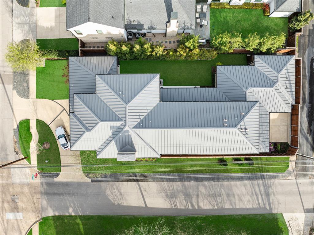 5000 Hanover Avenue Dallas, TX 75209 - Photo 34 of 36 a front view of a house with a garden and plants