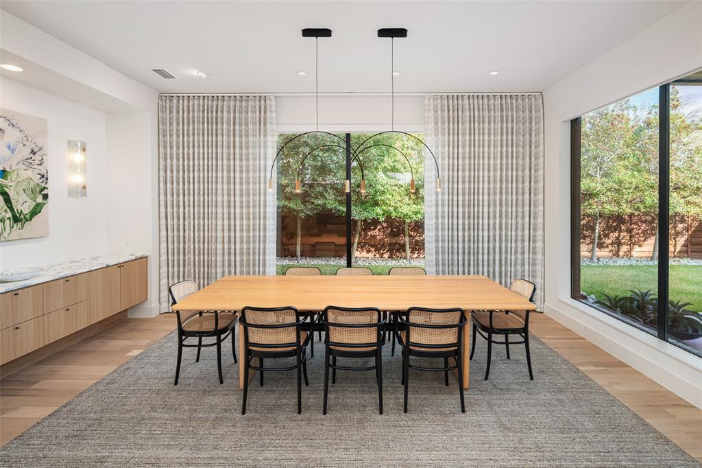 5000 Hanover Avenue Dallas, TX 75209 - Photo 8 of 36 a view of a dining room with furniture window and outside view