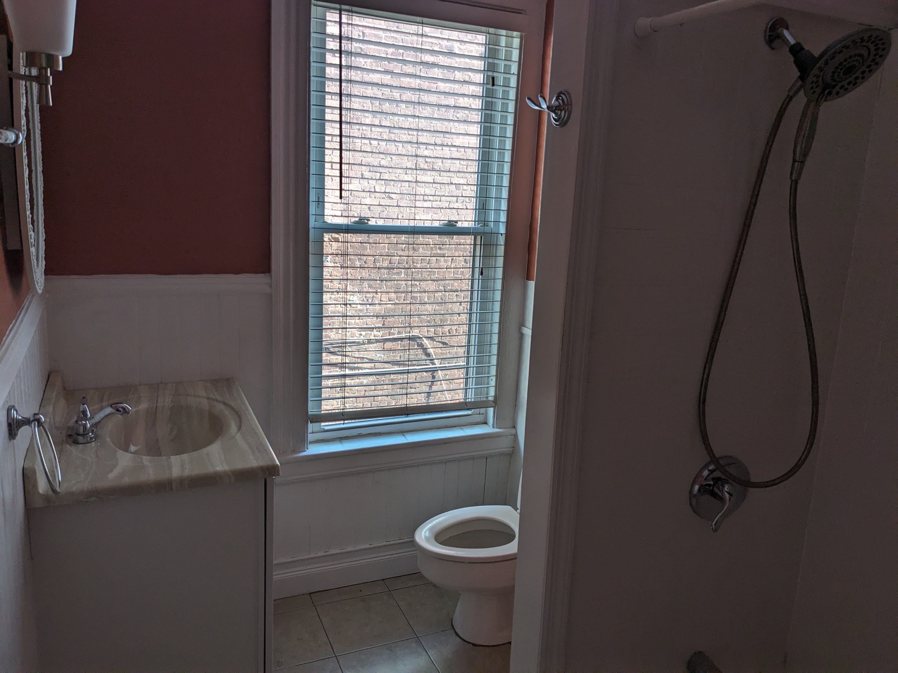 2870 Fairfield Avenue, Unit 2 Bridgeport, CT 06605 - Photo 11 of 15 a bathroom with a sink toilet and shower