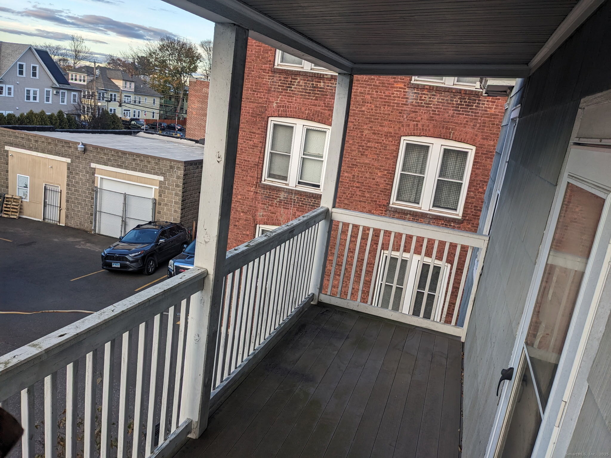2870 Fairfield Avenue, Unit 2 Bridgeport, CT 06605 - Photo 14 of 15 a view of a porch with a floor to ceiling window