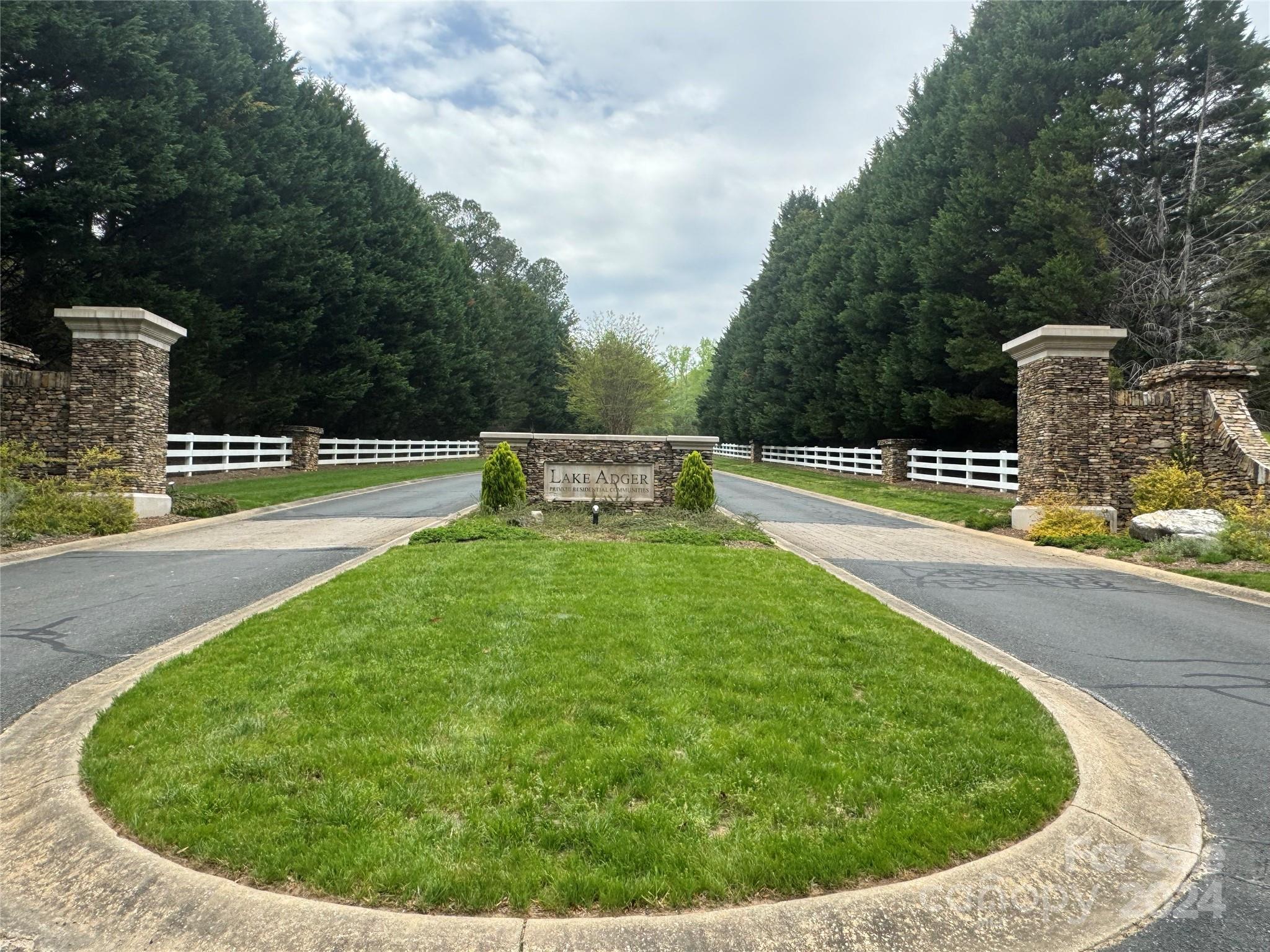 0 Garrett Rd Mill Spring Mill Spring, NC 28756 - Photo 4 of 4 a view of a swimming pool with a yard