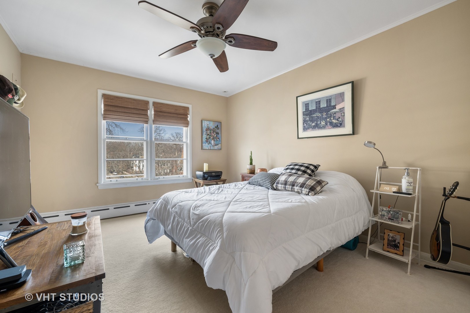 2238 Central Street, Unit 3 Evanston, IL 60201 - Photo 11 of 20 a bed room with a bed and a window