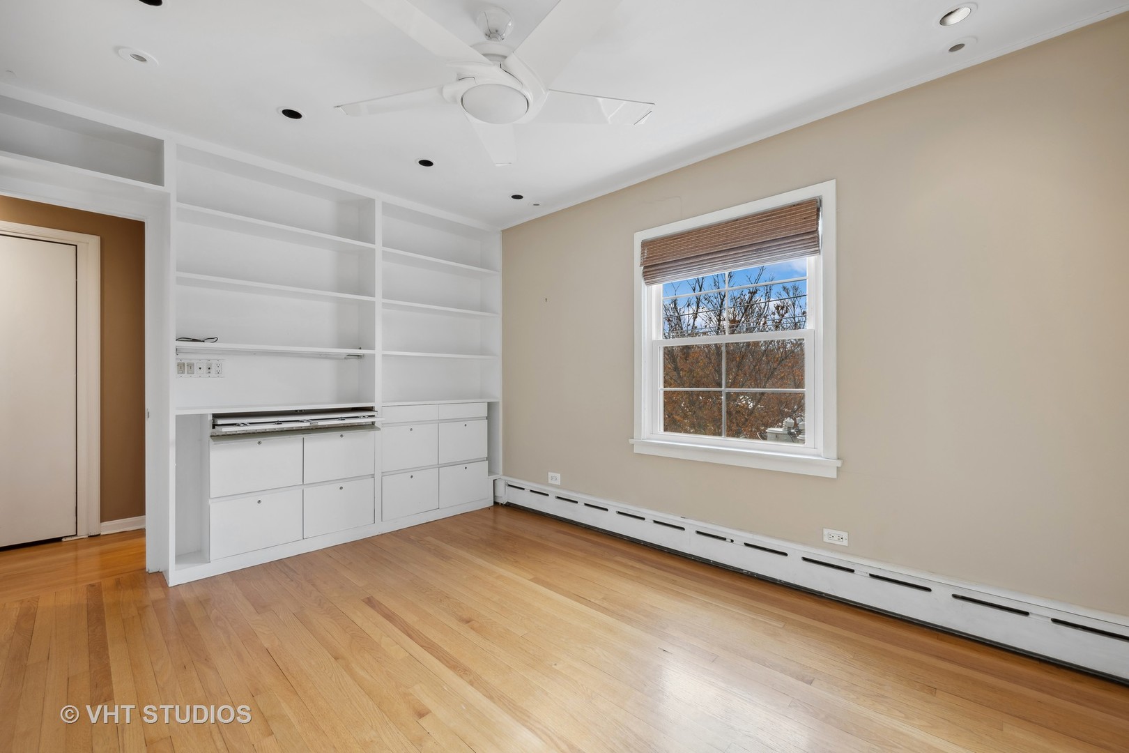 2238 Central Street, Unit 3 Evanston, IL 60201 - Photo 13 of 20 a view of an empty room with a window