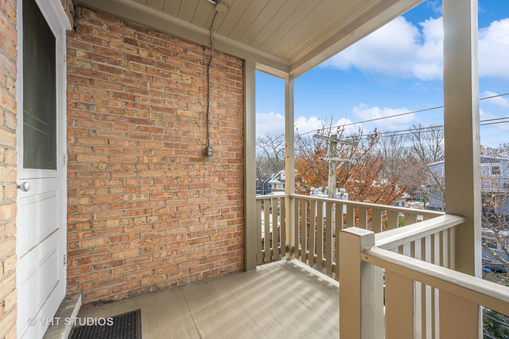 2238 Central Street, Unit 3 Evanston, IL 60201 - Photo 15 of 20 a view of balcony with wooden floor