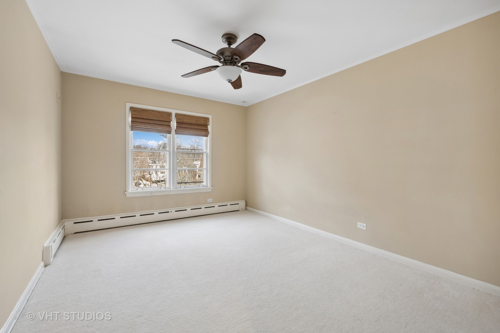2238 Central Street, Unit 3 Evanston, IL 60201 - Photo 10 of 20 an empty room with windows and fan