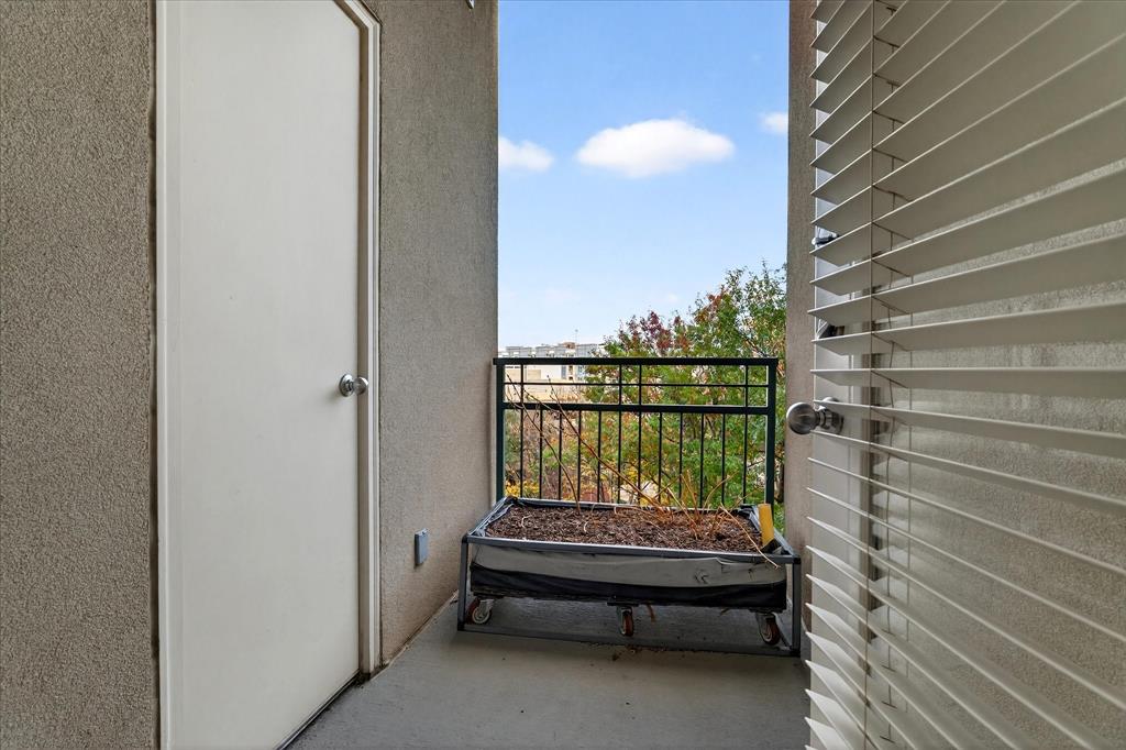5055 Addison Circle, Unit 409 Addison, TX 75001 - Photo 24 of 31 Balcony in Master Bedroom