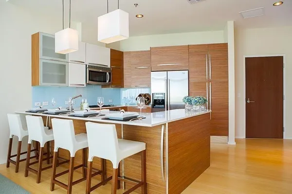 a kitchen with a sink and cabinets