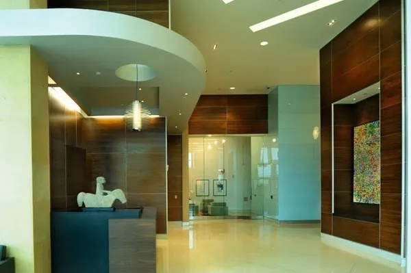 a bathroom with a glass door shower