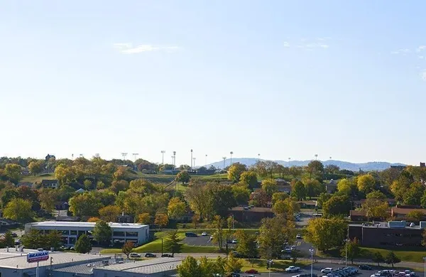 a view of a city with mountain