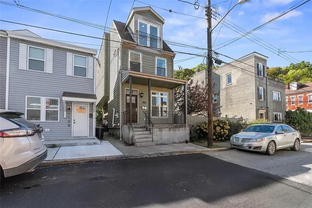 a car parked in front of a building