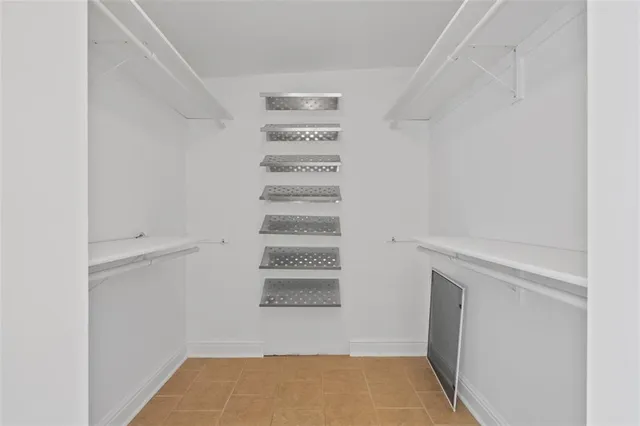 a view of a room with racks on the wall