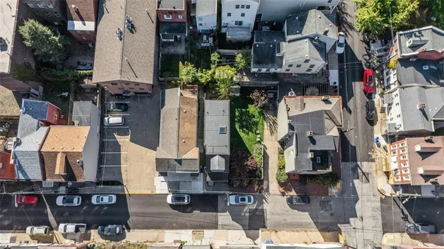 a street view with tall buildings