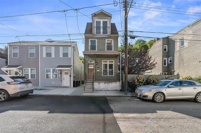 a car parked in front of a building