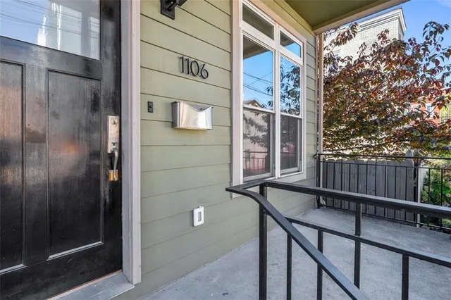 a view of a brick wall from a balcony