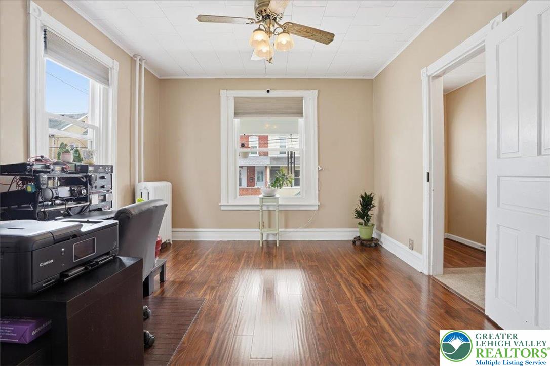 525 Ridge Street Emmaus, PA 18049 - Photo 29 of 68 This bright room features beautiful hardwood floors and ample natural light, creating an inviting atmosphere.