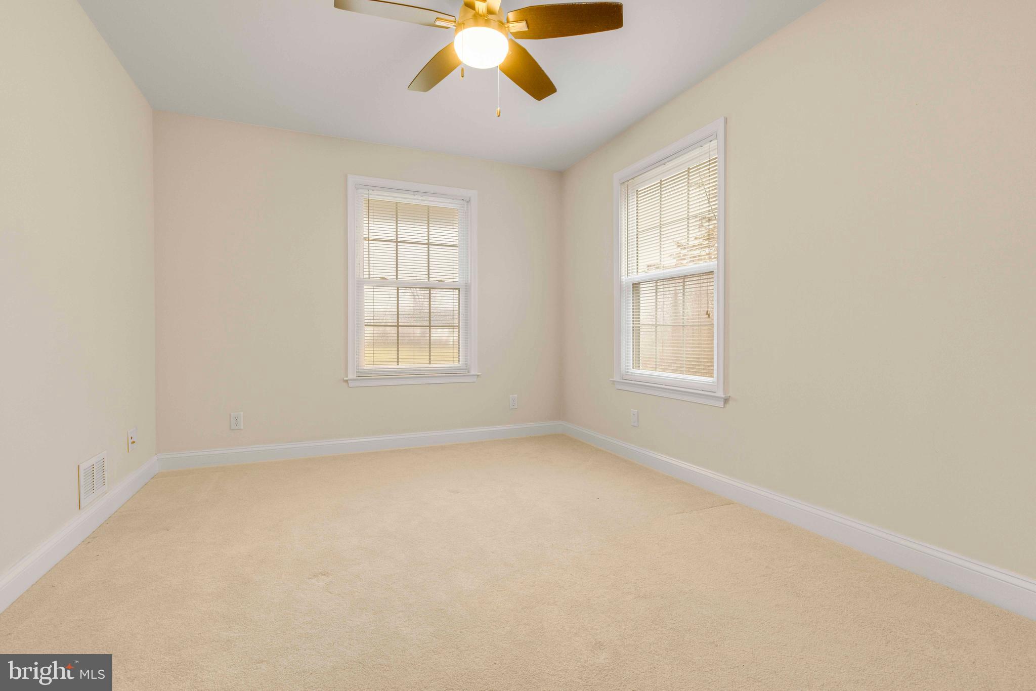 1608 County Line Road Chalfont, PA 18914 - Photo 16 of 31 an empty room with windows and fan
