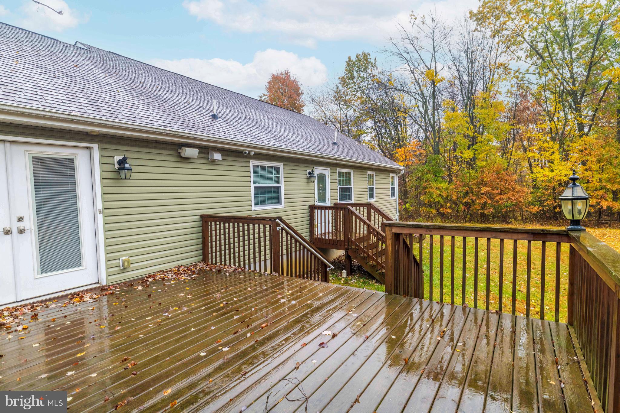 1608 County Line Road Chalfont, PA 18914 - Photo 25 of 31 a view of a house with wooden deck
