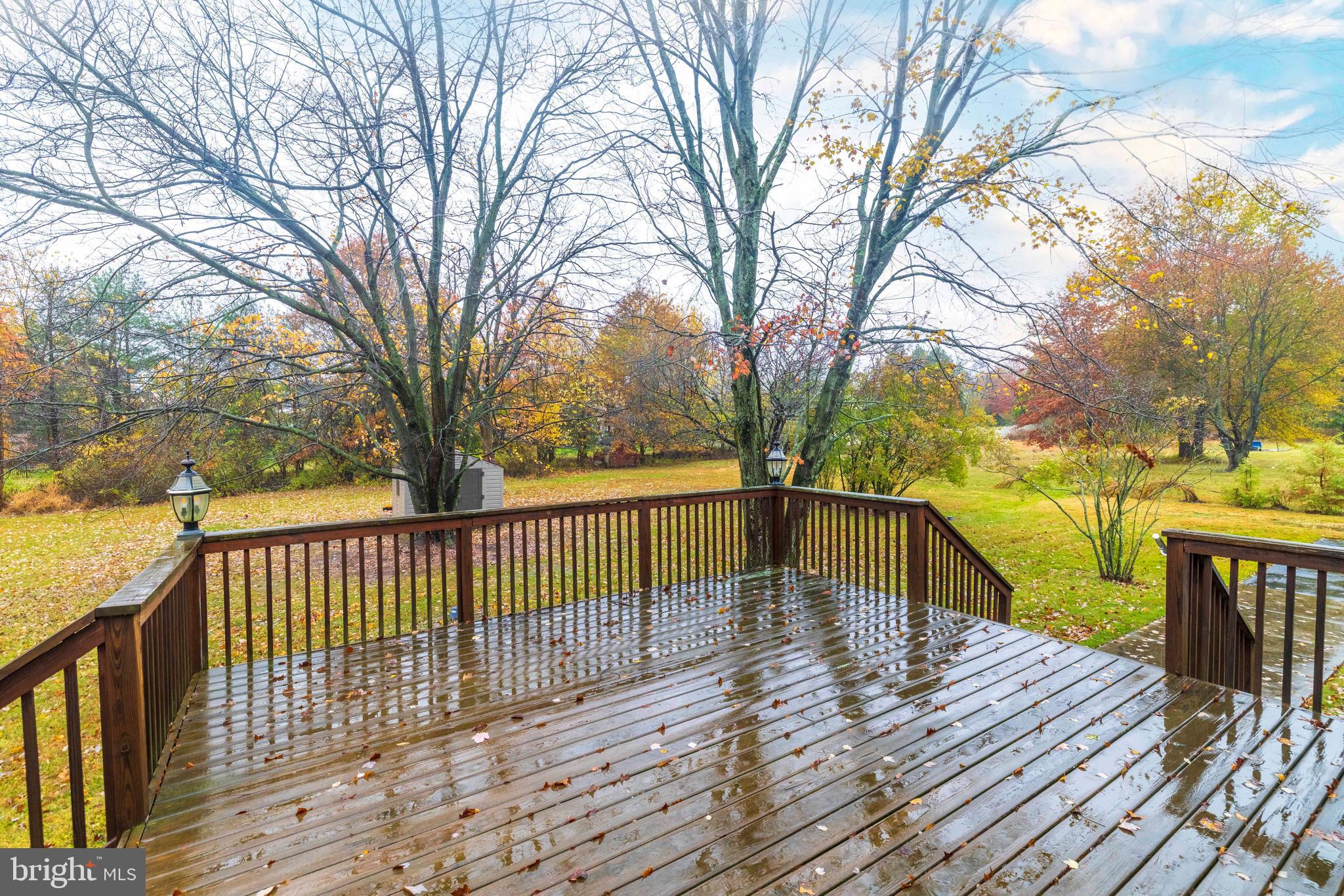 1608 County Line Road Chalfont, PA 18914 - Photo 26 of 31 a deck with trees in front of it