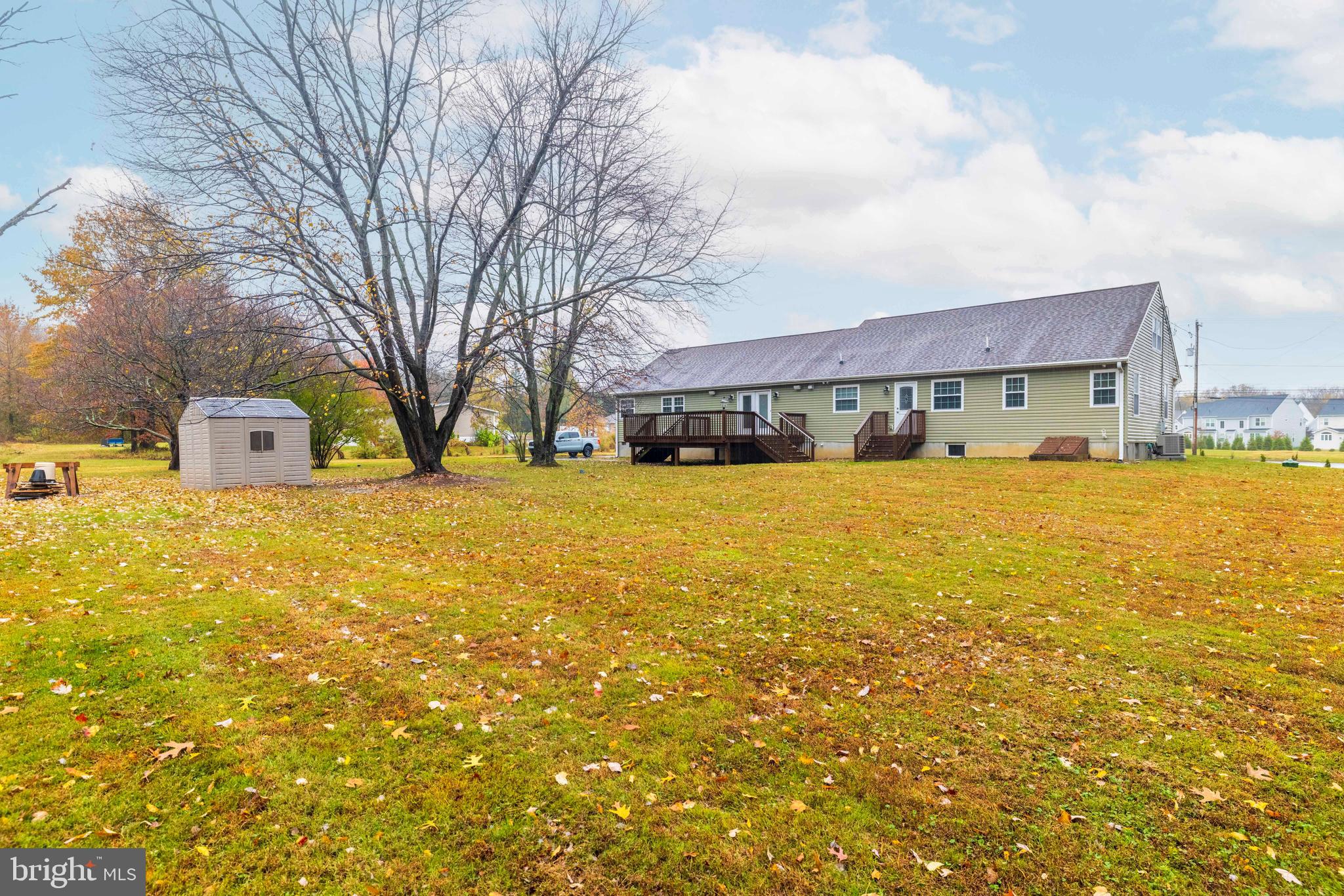 1608 County Line Road Chalfont, PA 18914 - Photo 27 of 31 a view of swimming pool with outdoor seating and house in the background