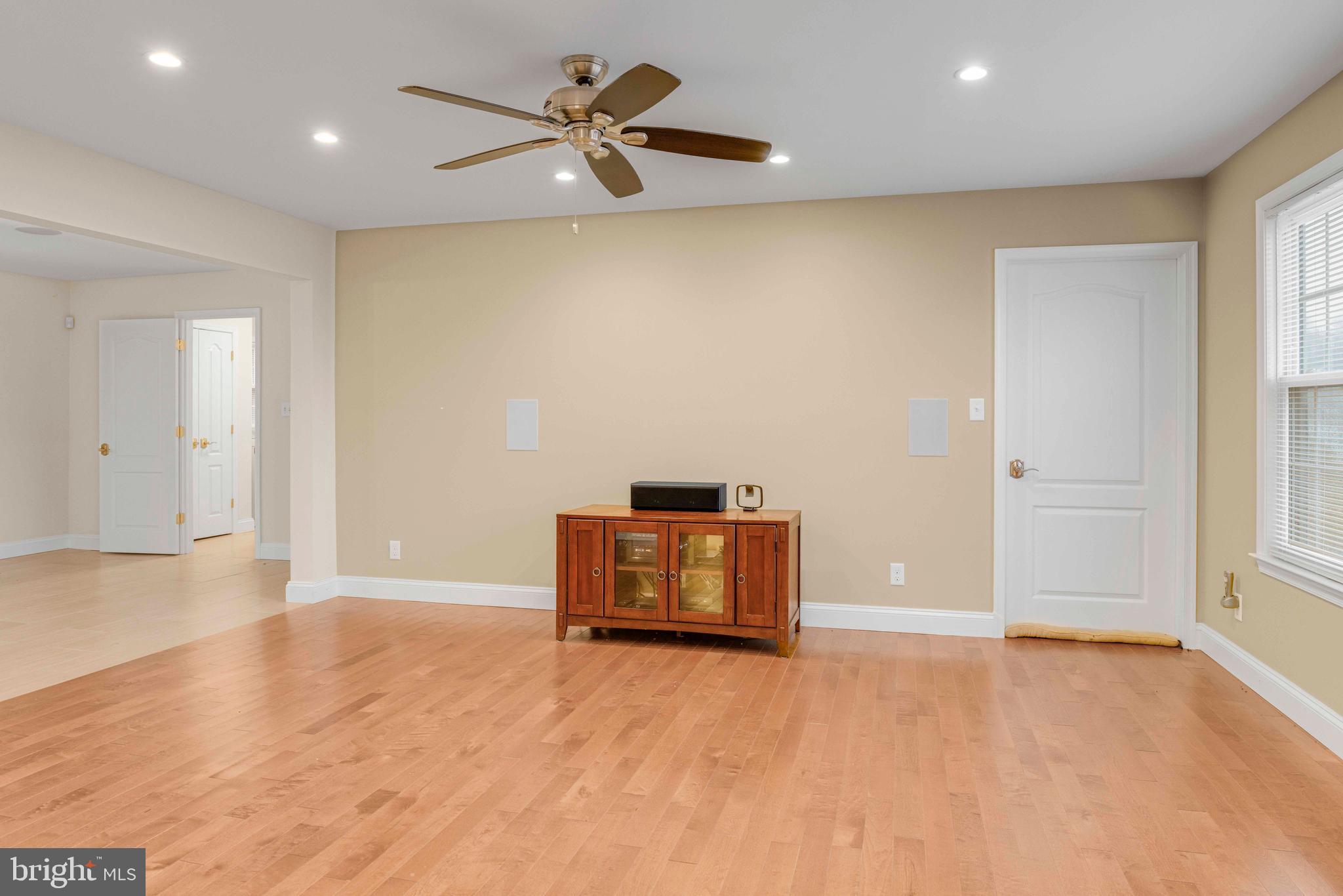 1608 County Line Road Chalfont, PA 18914 - Photo 6 of 31 en empty room with a window and a ceiling fan