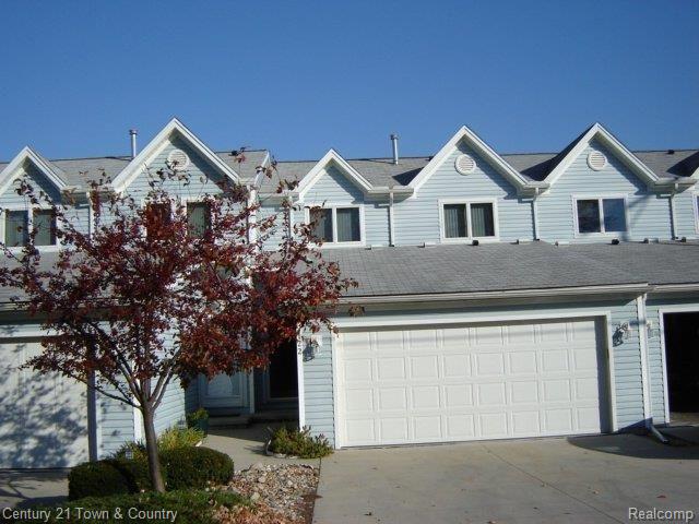 122 Kenyon Road, Unit 33 Algonac, MI 48001 - Photo 2 of 9 Over-sized garage