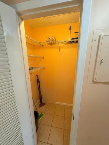 a view of a garden with lawn chairs