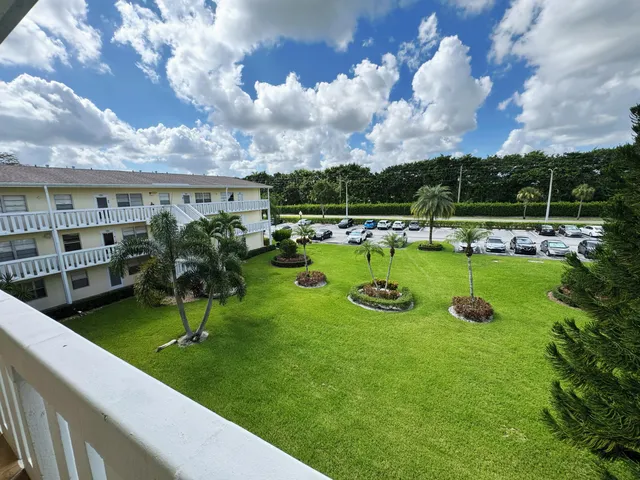 a view of swimming pool with a yard