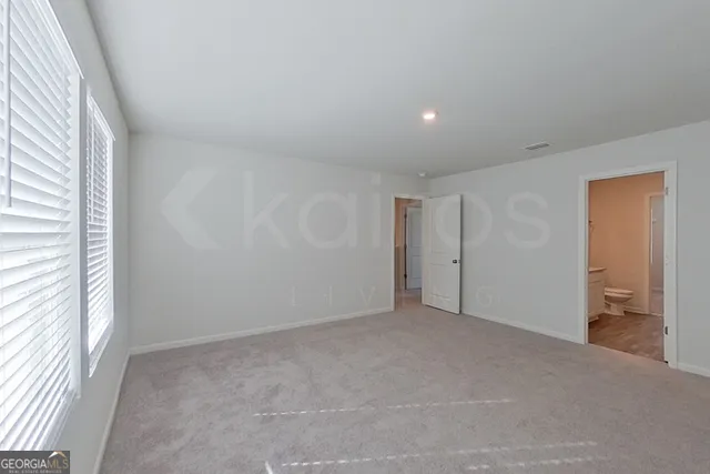 a view of a room that has a window in it