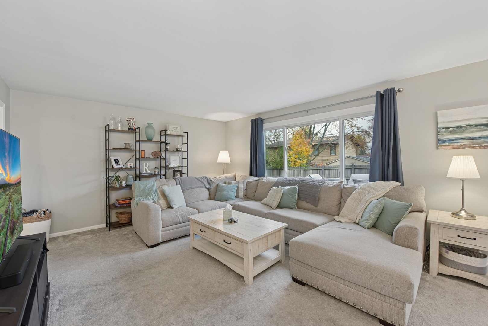 186 Ivy Lane Bloomingdale, IL 60108 - Photo 11 of 38 a living room with furniture and a large window