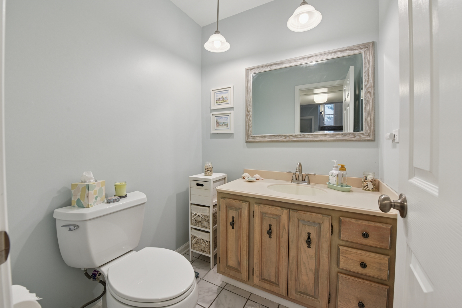 186 Ivy Lane Bloomingdale, IL 60108 - Photo 12 of 38 a bathroom with a granite countertop toilet sink and mirror