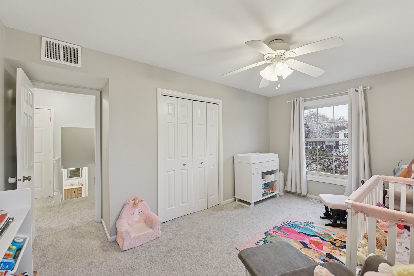 186 Ivy Lane Bloomingdale, IL 60108 - Photo 19 of 38 a bedroom with furniture and window