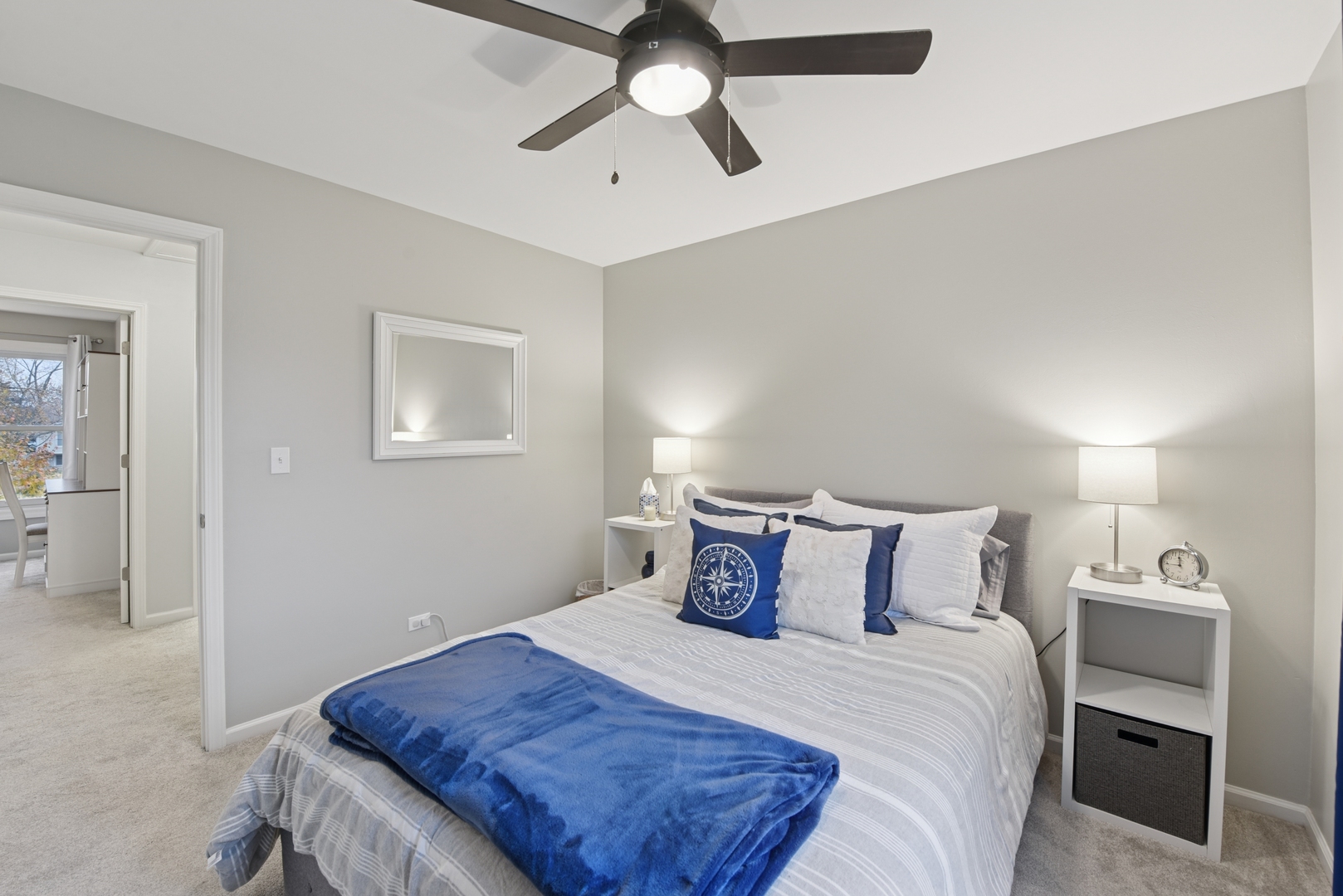 186 Ivy Lane Bloomingdale, IL 60108 - Photo 21 of 38 a bedroom with a bed and a chandelier