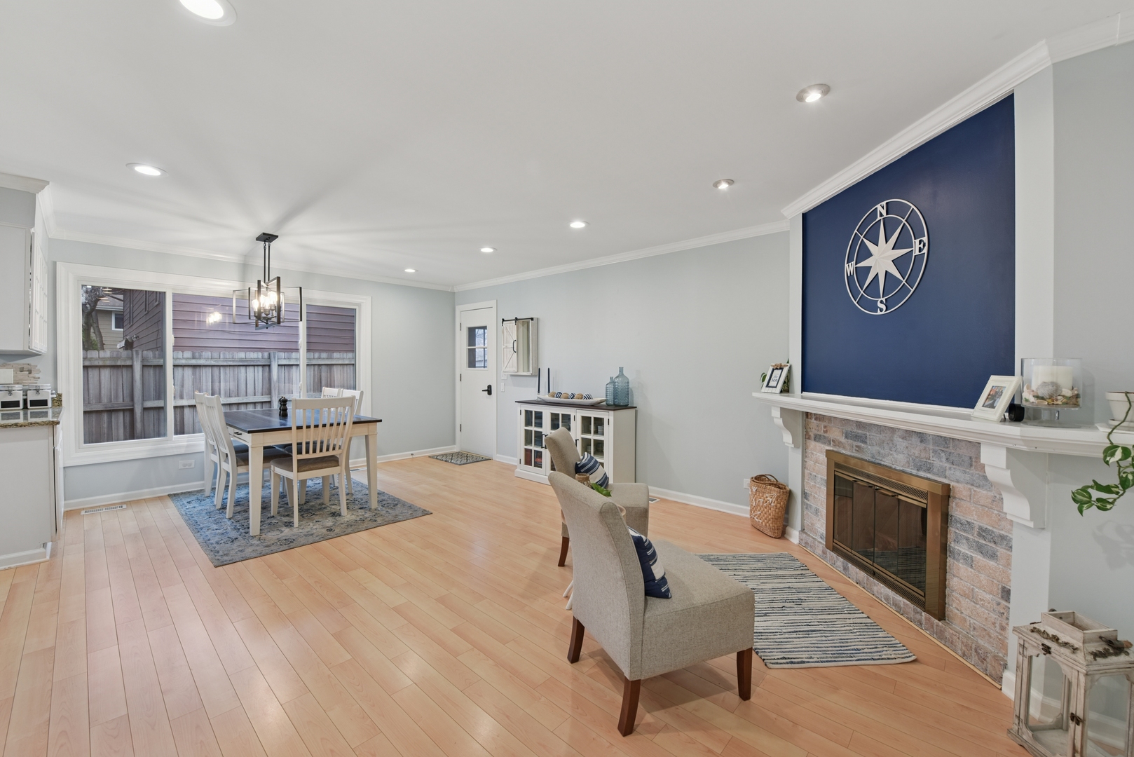 186 Ivy Lane Bloomingdale, IL 60108 - Photo 3 of 38 a living room with furniture and a fireplace