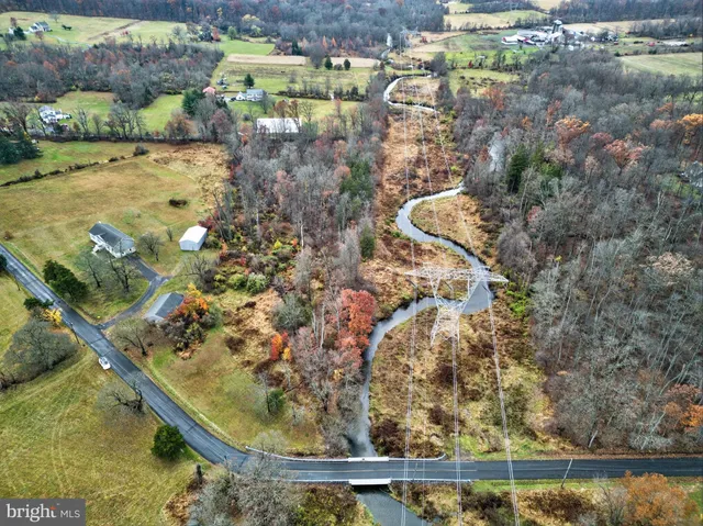 a view of swimming pool from a lake view