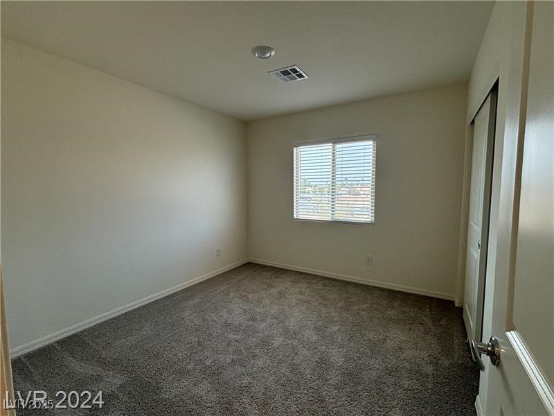 6184 Pink Cosmos Avenue Las Vegas, NV 89122 - Photo 7 of 9 Bedroom 2