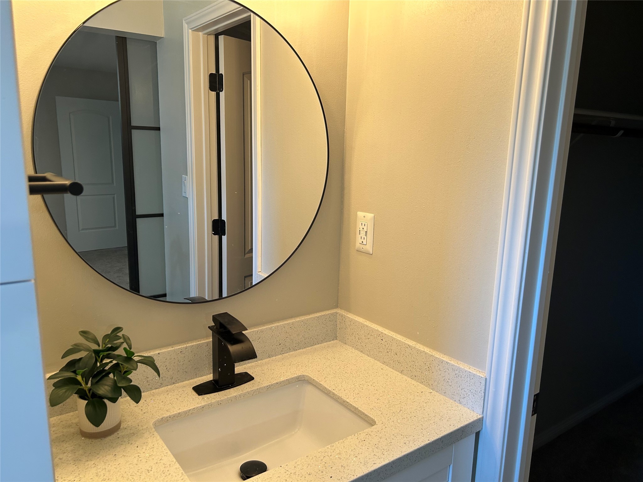 6018 Rena Street Houston, TX 77092 - Photo 18 of 28 a bathroom with a sink and a mirror