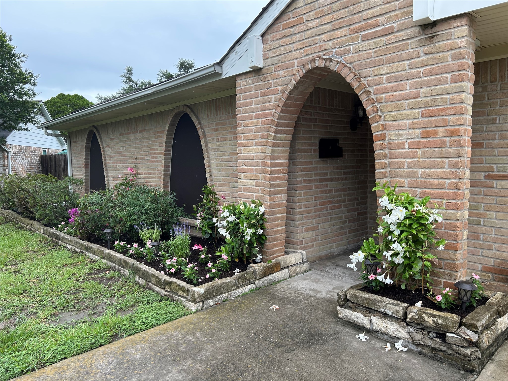 6018 Rena Street Houston, TX 77092 - Photo 22 of 28 a front view of a house with a yard