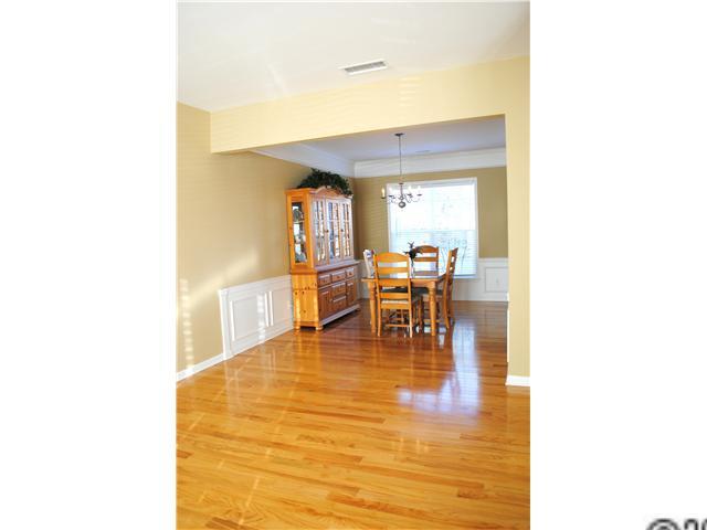2409 Coltsgate Road Waxhaw, NC 28173 - Photo 4 of 13 a living room with furniture and a table