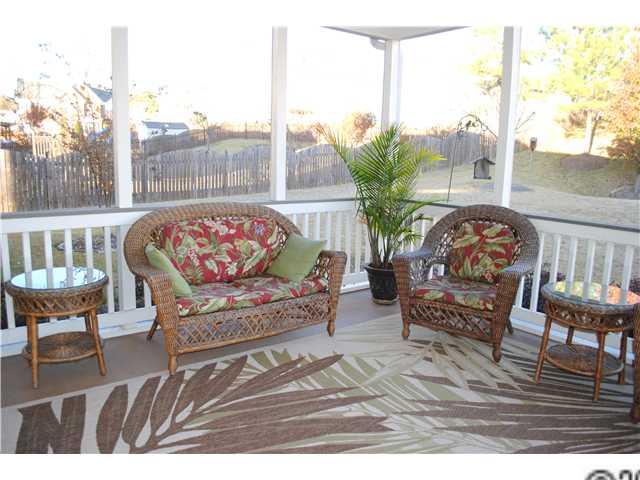 2409 Coltsgate Road Waxhaw, NC 28173 - Photo 10 of 13 a view of a chairs and table in the patio