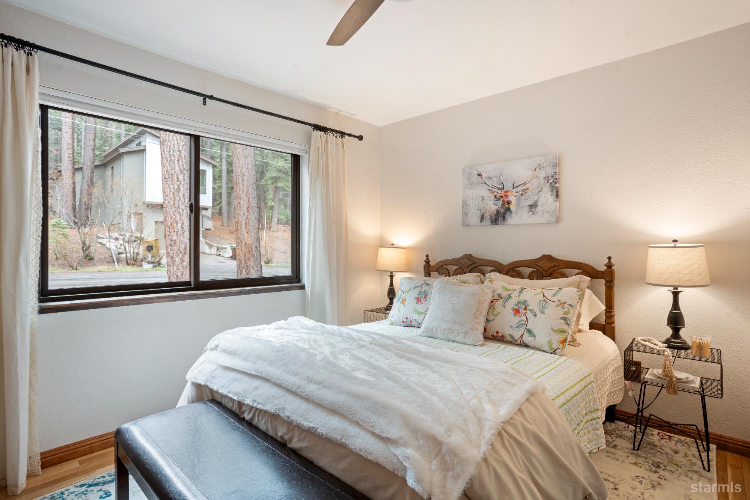 1408 Pebble Beach Road South Lake Tahoe, CA 96150 - Photo 20 of 34 a bedroom with a bed and a window