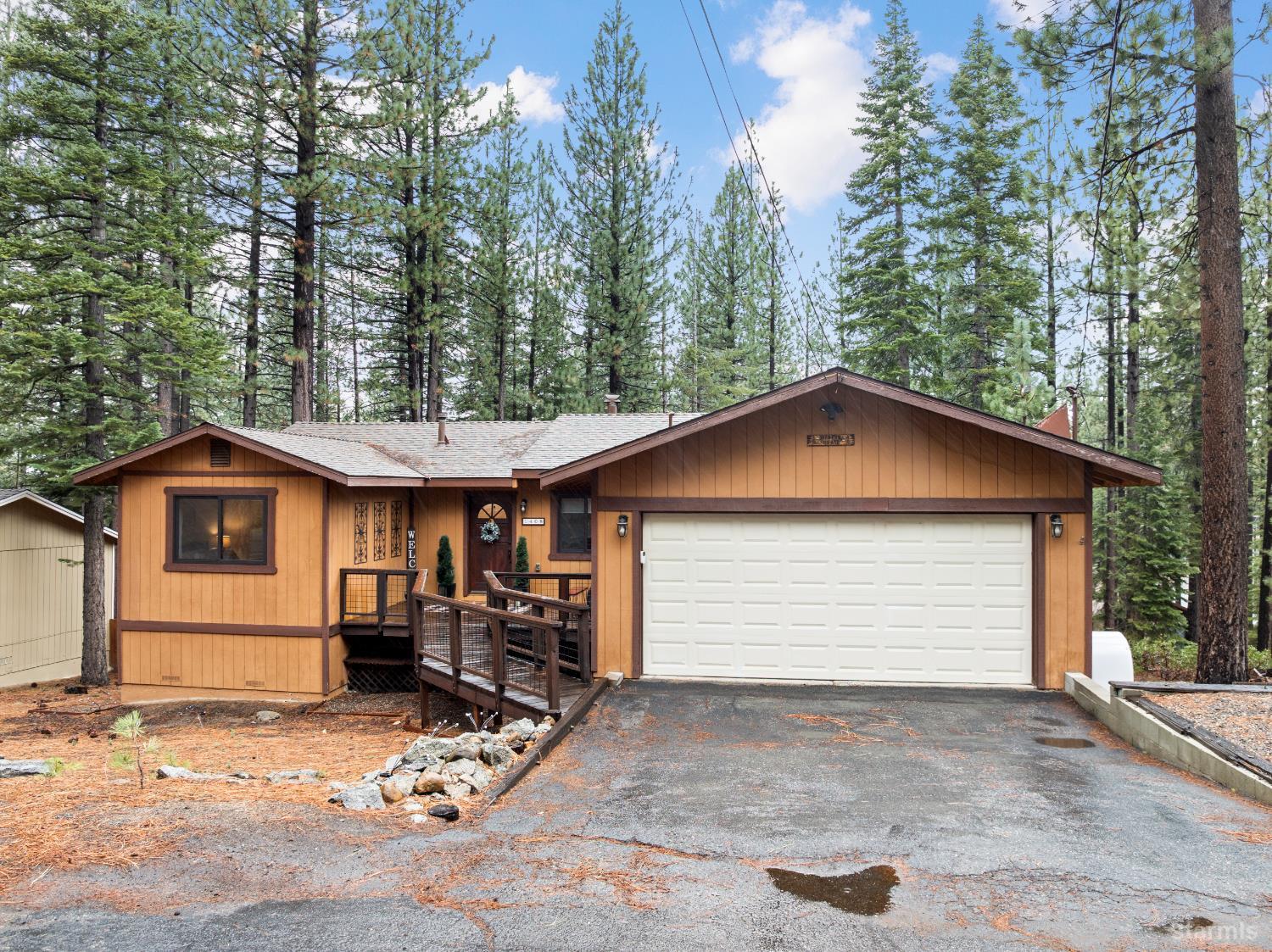 1408 Pebble Beach Road South Lake Tahoe, CA 96150 - Photo 2 of 34 a view of a house with a patio