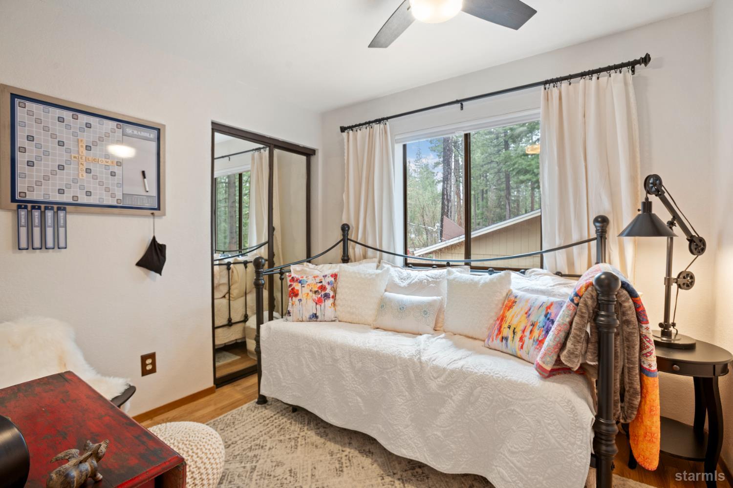 1408 Pebble Beach Road South Lake Tahoe, CA 96150 - Photo 22 of 34 a living room with furniture and a window
