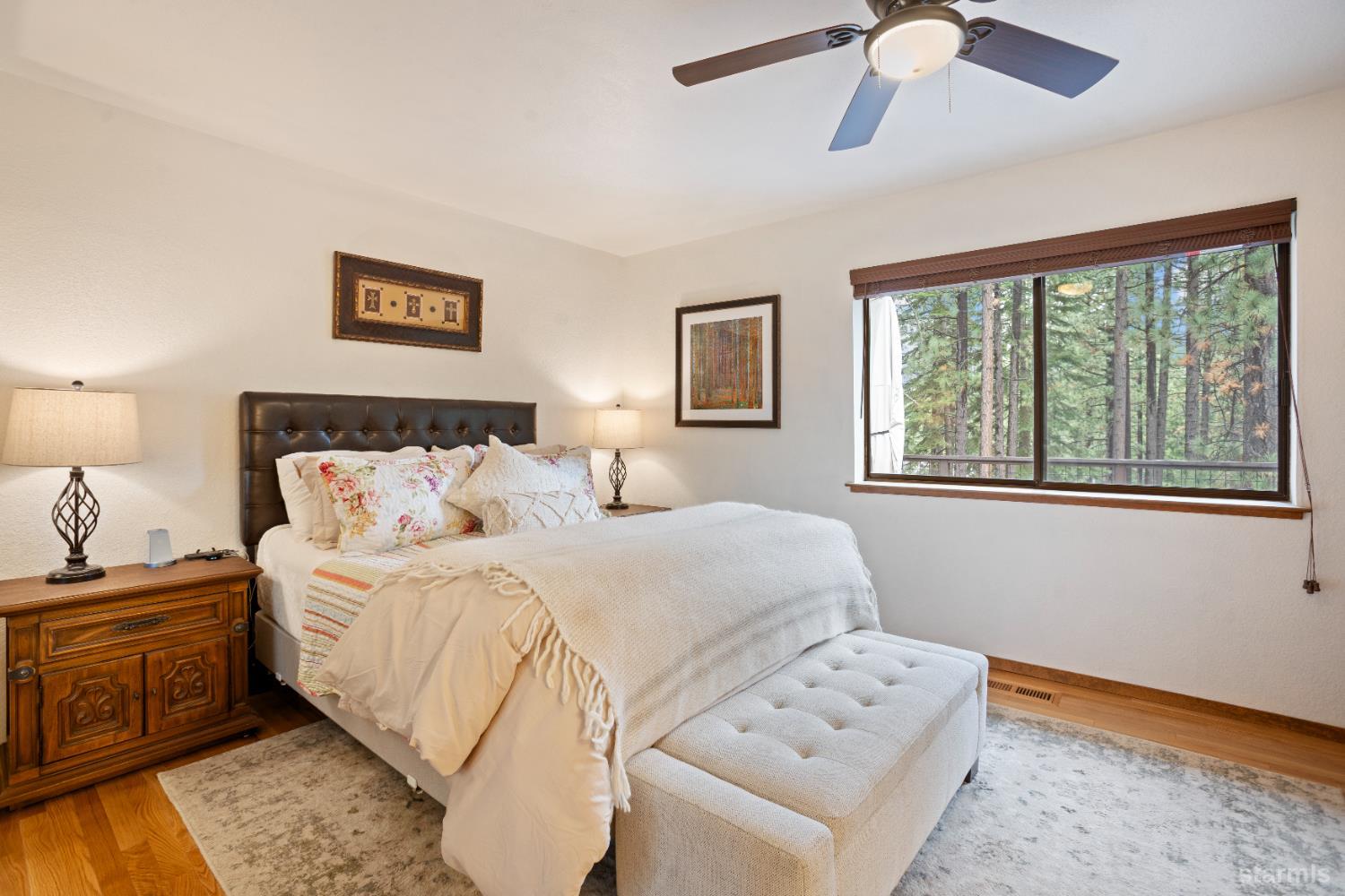 1408 Pebble Beach Road South Lake Tahoe, CA 96150 - Photo 23 of 34 a bedroom with a bed and a window