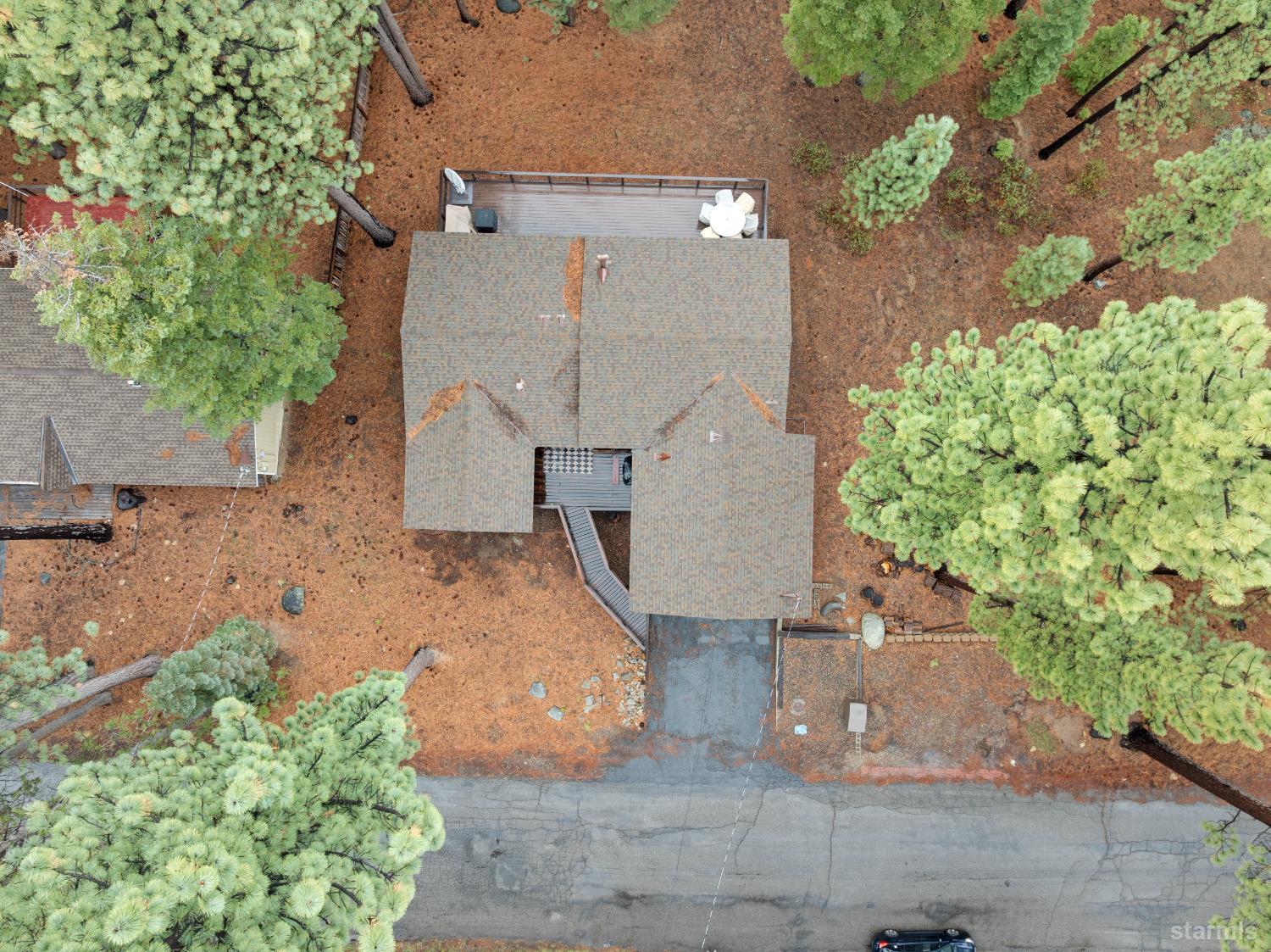 1408 Pebble Beach Road South Lake Tahoe, CA 96150 - Photo 31 of 34 an aerial view of a house with a yard